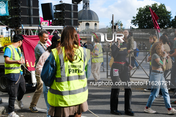 Environmentalists from Alternatia and MC Danse pour le climat demonstrate against Michel Barnier's government, in Paris, France, on October...