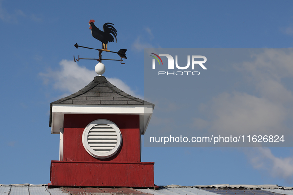 A weather vane sits atop a barn in Markham, Ontario, Canada, on September 30, 2024. 