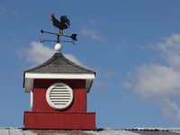 A weather vane sits atop a barn in Markham, Ontario, Canada, on September 30, 2024. (