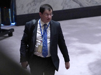 Russian First Deputy Permanent Representative to the UN Dmitry Polyansky exits during a Security Council meeting on migrant smuggling off th...