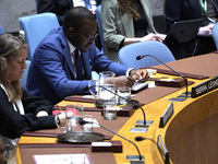 Michael Imran Kanu permanent representative  from Sierra Leone to the UN speaks during a Security Council meeting on migrant smuggling off t...