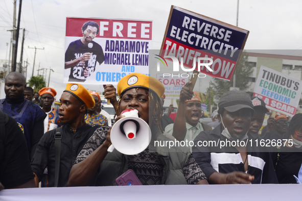 Activists stage a protest tagged #FearlessInOctober over increased hunger, insecurity, and economic hardship as Nigeria marks its 64th Indep...