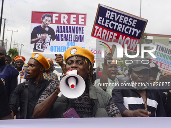 Activists stage a protest tagged #FearlessInOctober over increased hunger, insecurity, and economic hardship as Nigeria marks its 64th Indep...