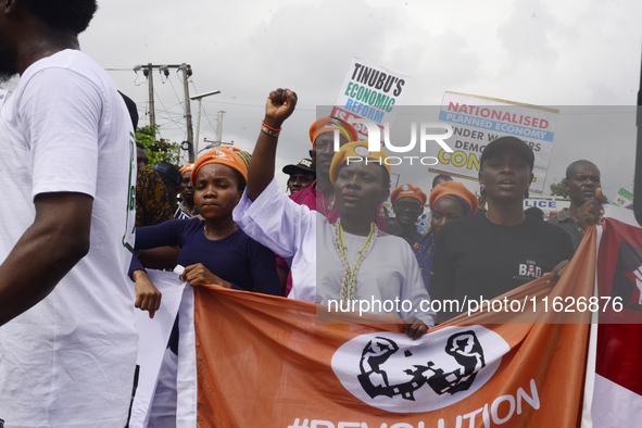 Activists stage a protest tagged #FearlessInOctober over increased hunger, insecurity, and economic hardship as Nigeria marks its 64th Indep...