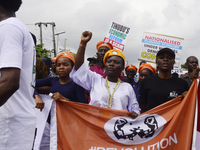 Activists stage a protest tagged #FearlessInOctober over increased hunger, insecurity, and economic hardship as Nigeria marks its 64th Indep...