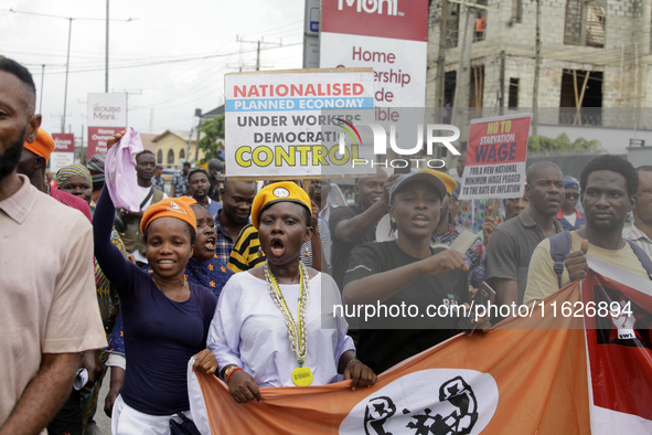 Activists stage a protest tagged #FearlessInOctober over increased hunger, insecurity, and economic hardship as Nigeria marks its 64th Indep...