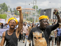 Activists stage a protest tagged #FearlessInOctober over increased hunger, insecurity, and economic hardship as Nigeria marks its 64th Indep...