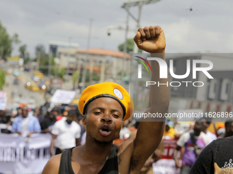 Activists stage a protest tagged #FearlessInOctober over increased hunger, insecurity, and economic hardship as Nigeria marks its 64th Indep...