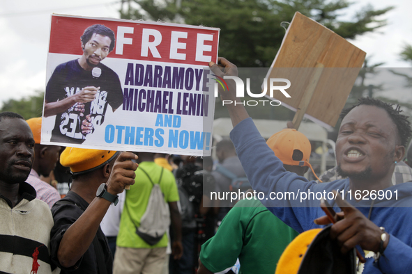 Activists stage a protest tagged #FearlessInOctober over increased hunger, insecurity, and economic hardship as Nigeria marks its 64th Indep...