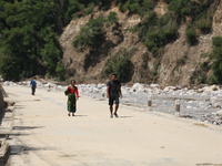 Nepali passengers travel through the BP Highway, a major highway that connects Kathmandu directly with the Southern Plains of Nepal, making...