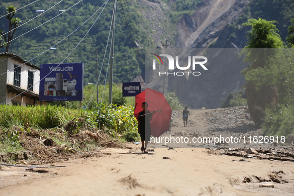 A Nepali passenger traveling through the BP Highway, a major highway that connects Kathmandu directly with the Southern Plains of Nepal, wad...