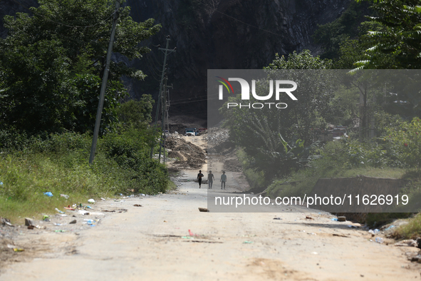 Nepali passengers travel through the BP Highway, a major highway that connects Kathmandu directly with the Southern Plains of Nepal, making...