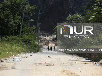 Nepali passengers travel through the BP Highway, a major highway that connects Kathmandu directly with the Southern Plains of Nepal, making...