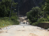 Nepali passengers travel through the BP Highway, a major highway that connects Kathmandu directly with the Southern Plains of Nepal, making...