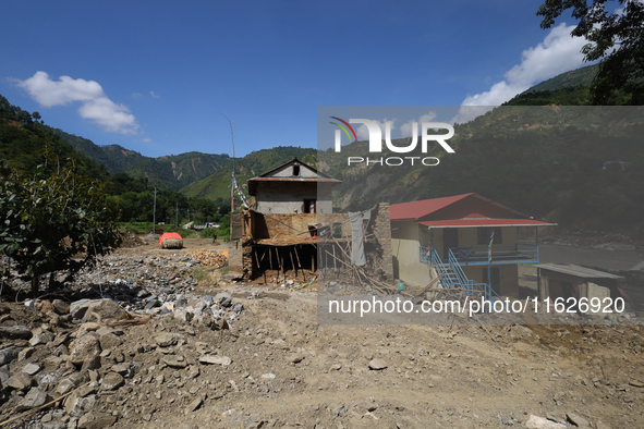 A house sustains damage from flooding in Kavrepalanchowk District along the BP Highway of Nepal, on October 1, 2024. 