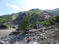 A house sustains damage from flooding in Kavrepalanchowk District along the BP Highway of Nepal, on October 1, 2024. (