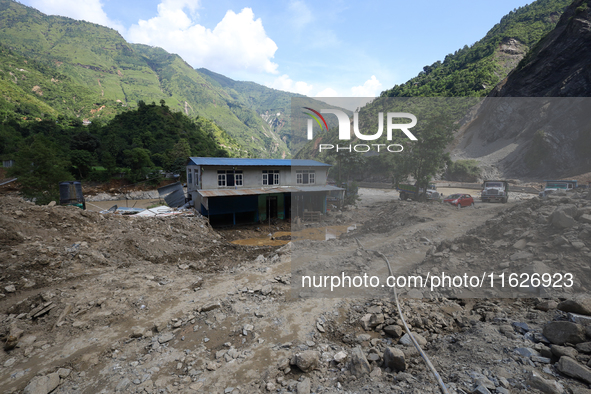 A house sustains damage from flooding in Kavrepalanchowk District along the BP Highway of Nepal, on October 1, 2024. 