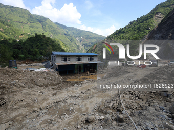 A house sustains damage from flooding in Kavrepalanchowk District along the BP Highway of Nepal, on October 1, 2024. (