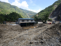 A house sustains damage from flooding in Kavrepalanchowk District along the BP Highway of Nepal, on October 1, 2024. (