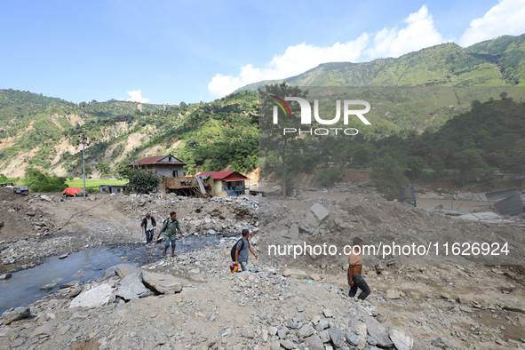 Nepali passengers travel through the BP Highway, a major highway that connects Kathmandu directly with the Southern Plains of Nepal, making...