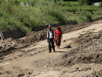 Nepali passengers travel through the BP Highway, a major highway that connects Kathmandu directly with the Southern Plains of Nepal, making...