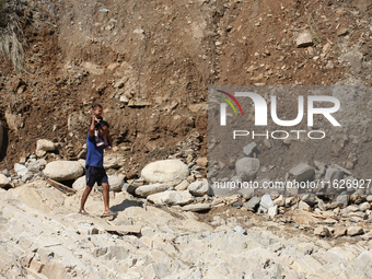 Nepali passengers travel through the BP Highway, a major highway that connects Kathmandu directly with the Southern Plains of Nepal, making...