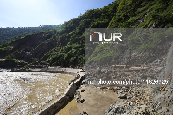 A section of BP Highway, a major highway that connects Kathmandu directly with the Southern Plains of Nepal, is damaged by a landslide in Ka...