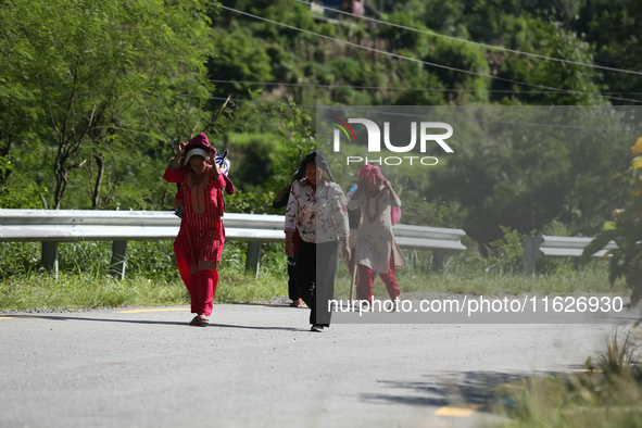 Nepali passengers travel through the BP Highway, a major highway that connects Kathmandu directly with the Southern Plains of Nepal, making...