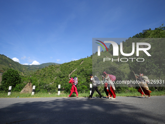 Nepali passengers travel through the BP Highway, a major highway that connects Kathmandu directly with the Southern Plains of Nepal, making...