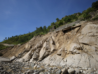 A section of BP Highway, a major highway that connects Kathmandu directly with the Southern Plains of Nepal, is damaged by a landslide in Ka...