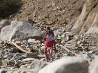 Nepali passengers travel through the BP Highway, a major highway that connects Kathmandu directly with the Southern Plains of Nepal, making...