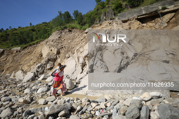 Nepali passengers travel through the BP Highway, a major highway that connects Kathmandu directly with the Southern Plains of Nepal, making...