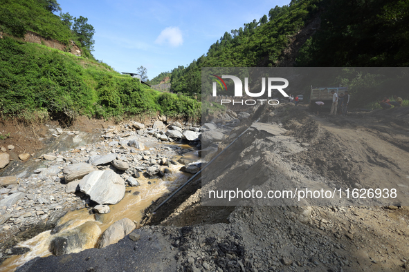 A landslide sweeps a section of BP Highway in Nepal on October 1, 2024, after heavy rainfall in the last week of September. 