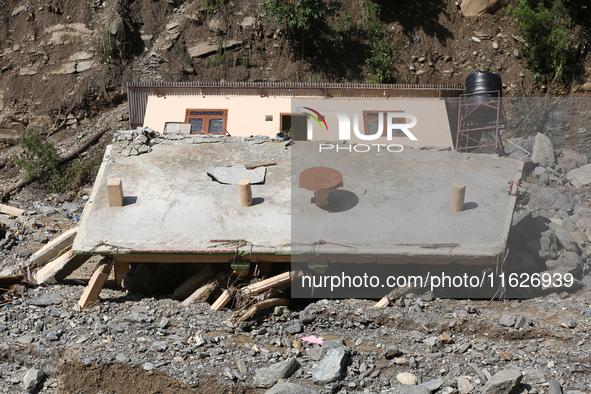 A house is damaged by flooding in Kavrepalanchowk District, Nepal, on October 1, 2024. 