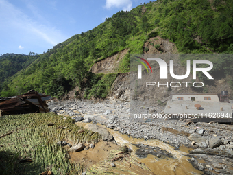 Flood damages houses and crops in Kavrepalanchowk District, Nepal, on October 1, 2024. (