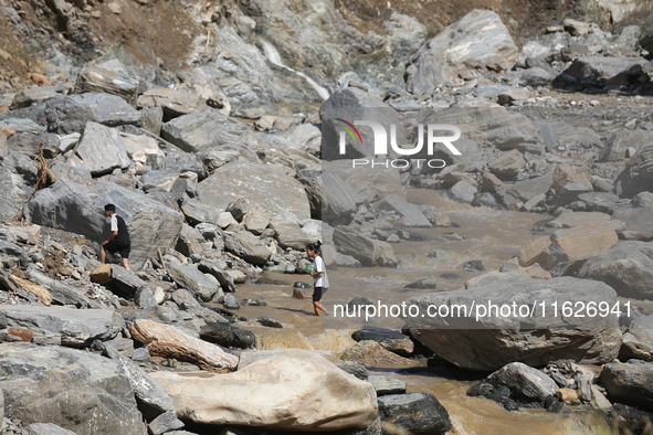 Nepali passengers travel through the BP Highway, a major highway that connects Kathmandu directly with the Southern Plains of Nepal, making...