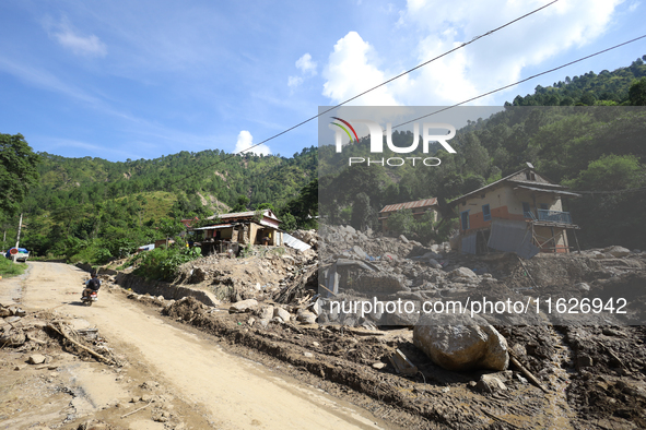 A house is damaged by flooding in Kavrepalanchowk District, Nepal, on October 1, 2024. 