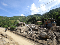 A house is damaged by flooding in Kavrepalanchowk District, Nepal, on October 1, 2024. (