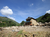 A house sustains damage from flooding in Kavrepalanchowk District along the BP Highway of Nepal, on October 1, 2024. (