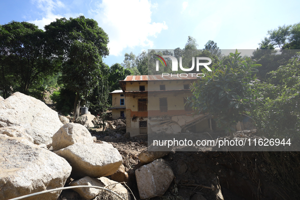 A house sustains damage from flooding in Kavrepalanchowk District along the BP Highway of Nepal, on October 1, 2024. 