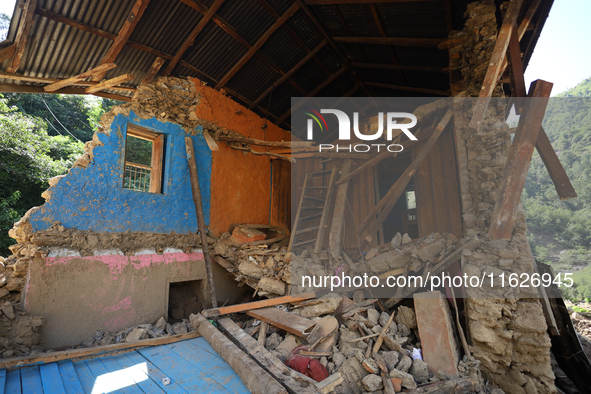 A house sustains damage from flooding in Kavrepalanchowk District along the BP Highway of Nepal, on October 1, 2024. 