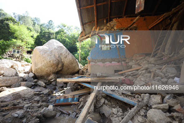 A house sustains damage from flooding in Kavrepalanchowk District along the BP Highway of Nepal, on October 1, 2024. 