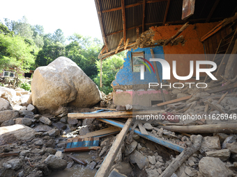 A house sustains damage from flooding in Kavrepalanchowk District along the BP Highway of Nepal, on October 1, 2024. (