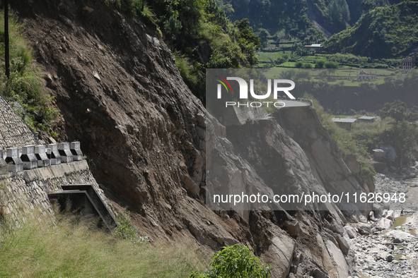 A section of BP Highway, a major highway that connects Kathmandu directly with the Southern Plains of Nepal, is damaged by a landslide in Ka...