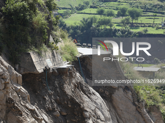 A section of BP Highway, a major highway that connects Kathmandu directly with the Southern Plains of Nepal, is damaged by a landslide in Ka...