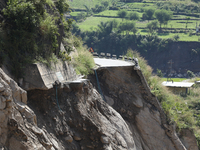 A section of BP Highway, a major highway that connects Kathmandu directly with the Southern Plains of Nepal, is damaged by a landslide in Ka...