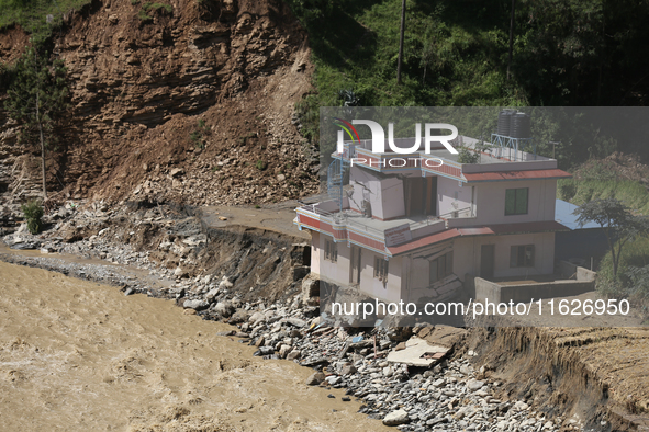 A house sustains damage from flooding in Kavrepalanchowk District along the BP Highway of Nepal, on October 1, 2024. 