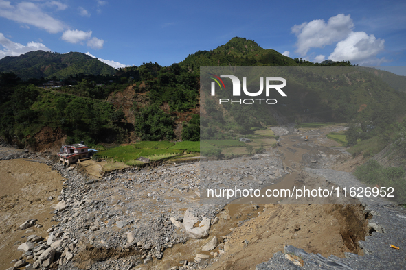 A section of BP Highway, a major highway that connects Kathmandu directly with the Southern Plains of Nepal, is damaged by a landslide in Ka...