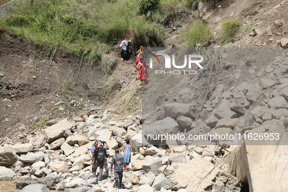 Nepali passengers travel through the BP Highway, a major highway that connects Kathmandu directly with the Southern Plains of Nepal, making...