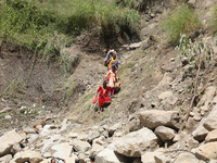 Nepali passengers travel through the BP Highway, a major highway that connects Kathmandu directly with the Southern Plains of Nepal, making...